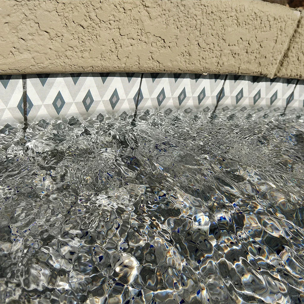 Aquatica Fiorella 6x6 porcelain pool tile installed pool view