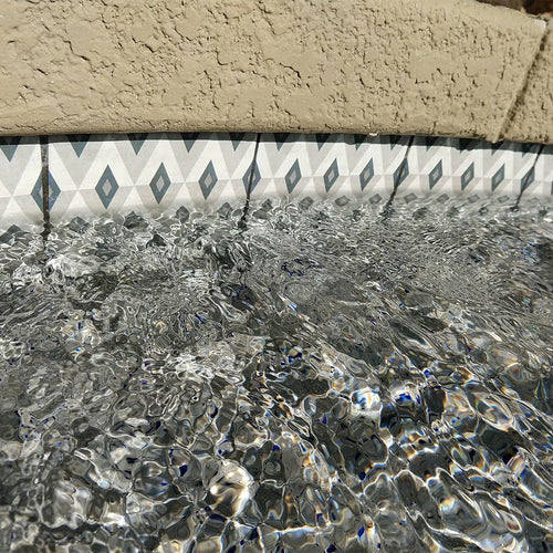 Aquatica Fiorella 6x6 porcelain pool tile installed pool view
